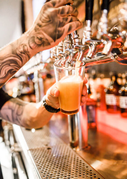 beer on draft being poured